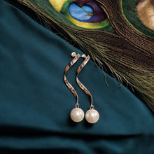 Elegant Wave Pearl Dangler Earrings - Silver