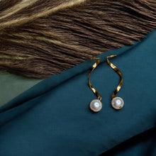 Elegant Wave Pearl Dangler Earrings - Gold
